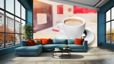 Cup of tasty hot espresso coffee on the desk Wall mural