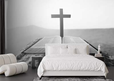 Dark cross on holy bible book Wall mural