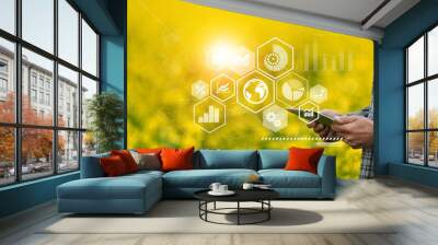 Farmer using digital tablet computer and modern interface icons, Business agriculture technology concept. Wall mural