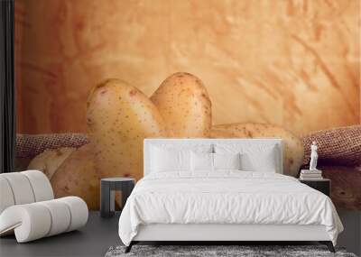 Fresh ripe potato vegetable on the desk Wall mural