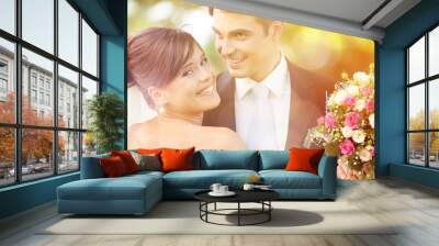 Happy just married young couple Wall mural