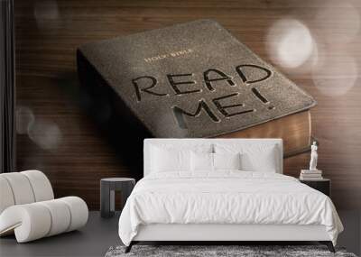 Holy Bible  book with read me letters on a wooden background Wall mural