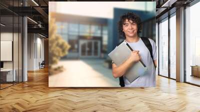 Individual portrait of student young man Wall mural