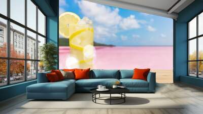 Lemonade with fresh slice lemon on desk Wall mural