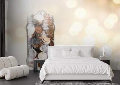 Money Jar with  coins on background Wall mural