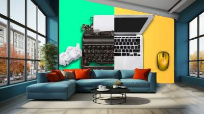 Old vs new technology. Modern computer and typewriter Wall mural