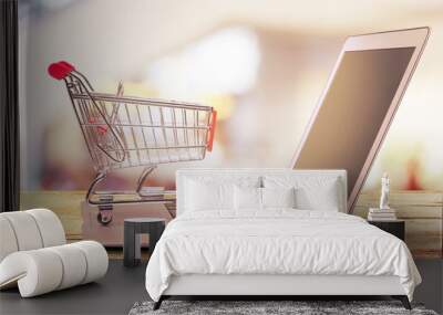 Online shopping concept with laptop and shopping Wall mural