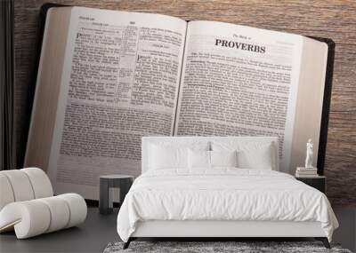 Open Bible with letters for the words of Jesus Christ, opened to the book on desk. Wall mural