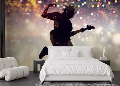 Portrait of a Musician Jumping while Playing Wall mural