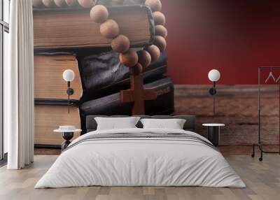 Praying wooden cross and Holy Bible book concept Wall mural