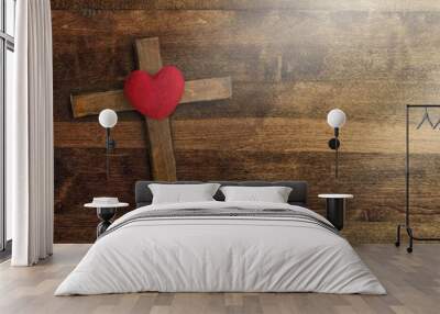 Red heart and wooden cross on desk Wall mural