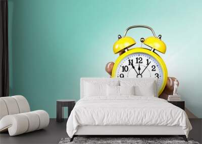 Retro alarm clock on table  background Wall mural