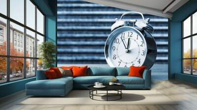 Retro alarm clock on table  background Wall mural