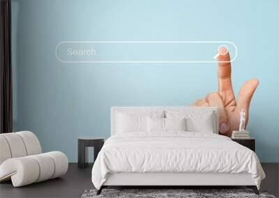 Searching information concept. Hand of man touching in icon search Wall mural