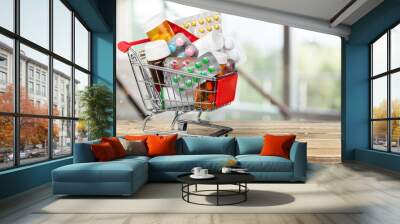 Shopping Cart with pills isolated on  background. Wall mural