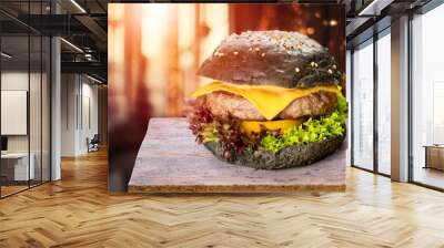 Tasty hot cheese beef burger on desk Wall mural