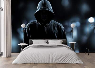 Thief in black clothes on grey background Wall mural