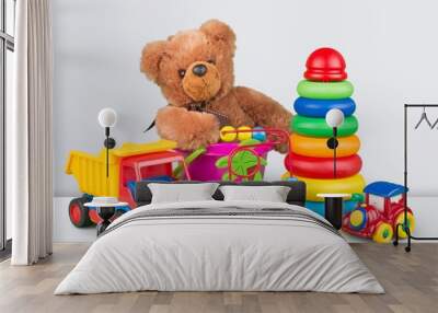 Toys collection isolated on light background Wall mural