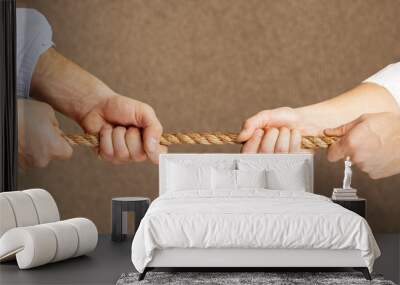 Tug war, two businessmen pulling a rope in opposite directions Wall mural