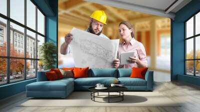 Two engineer working at the site of a building project Wall mural