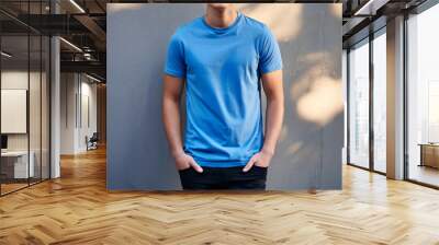 Young Model Shirt Mockup, Boy wearing blue t-shirt on street in daylight, Shirt Mockup Template on hipster adult for design print, Male guy wearing casual t-shirt mockup placement Wall mural