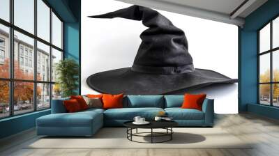 Black witch hat with a wide brim placed on white background with lots of empty space halloween day Wall mural