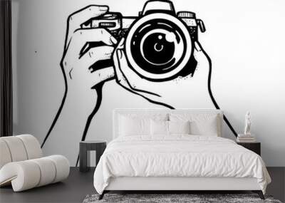 female hand holding camera on white background Wall mural