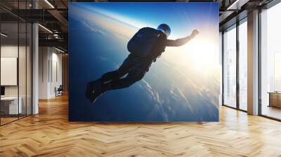 Skydiver soaring through the sky at sunset Wall mural