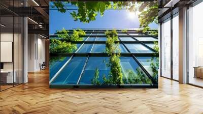 Urban Skyscraper with Vibrant Green Vines and Sunlit Windows Wall mural