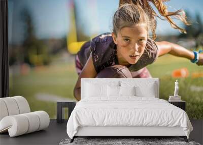 Portrait of a female high school flag football player Wall mural