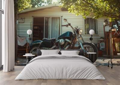 A motorcycle is parked in front of a white house. Wall mural