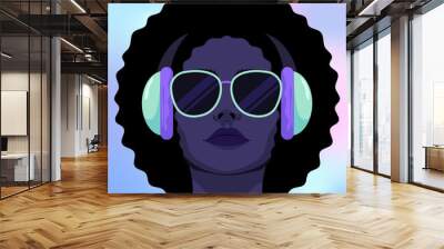 Trendy chic woman wearing headphones listening to music Wall mural