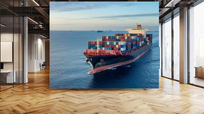 A cargo ship sailing on the open sea, loaded with containers. The ocean expanse is vast, with calm waters. The ship is a heavy-duty maritime transport vessel, with multiple decks and a large hull. Wall mural