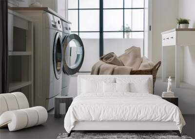 A clean and stylish interior of a modern laundry room, featuring a sleek washing machine and a basket filled with freshly laundered towels. Wall mural