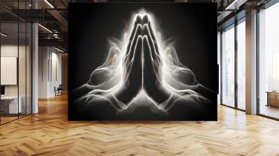 A praying hands with faith in religion and belief in God on dark background.  Wall mural