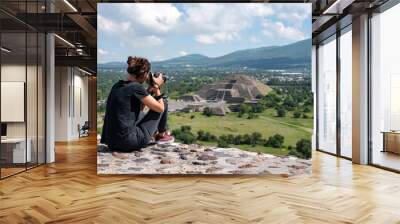 Tourist taking photos of Tehotihuacan Wall mural