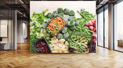 A set of foods for the winter. Various of frozen vegetables and berries Wall mural