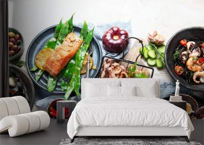 Assortment variousfish dishes - octopus, shrimp, crab, seafood, mussels, salmon. Wall mural