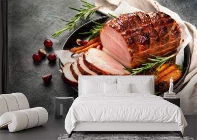 Baked ham with vegetables on dark background. Wall mural