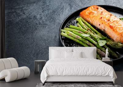 baked salmon with asparagus on gray background. Wall mural