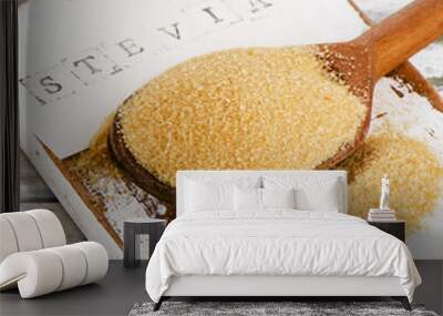 Cane sugar with stevia in an old spoon. Wall mural