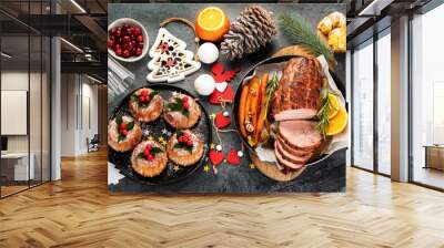 Christmas dinner table setting on dark background. Wall mural