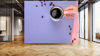 Cup of cofee on color background. Wall mural