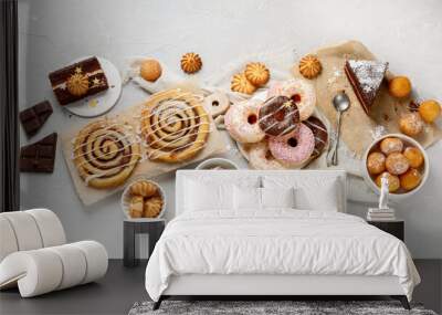 Desserts assortment on light background. Wall mural