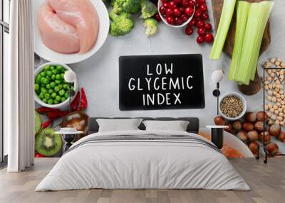 Foods with low glycemic index on gray background. Wall mural