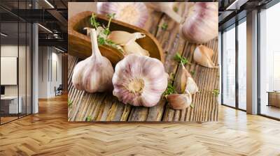 garlic on a wooden board Wall mural