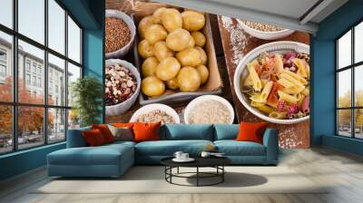 Healthy Food: Best Sources of Carbs on a wooden table. Wall mural