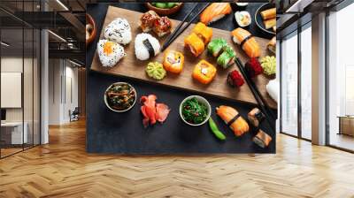 Japanese food assortment on dark background. Wall mural