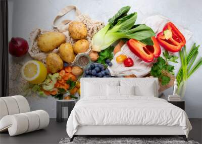 Selection of fresh raw vegetables, fruits and beans on light gray background. Wall mural