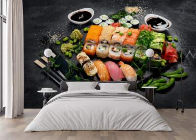 Sushi and roll set on dark background. Traditional food concept. Wall mural